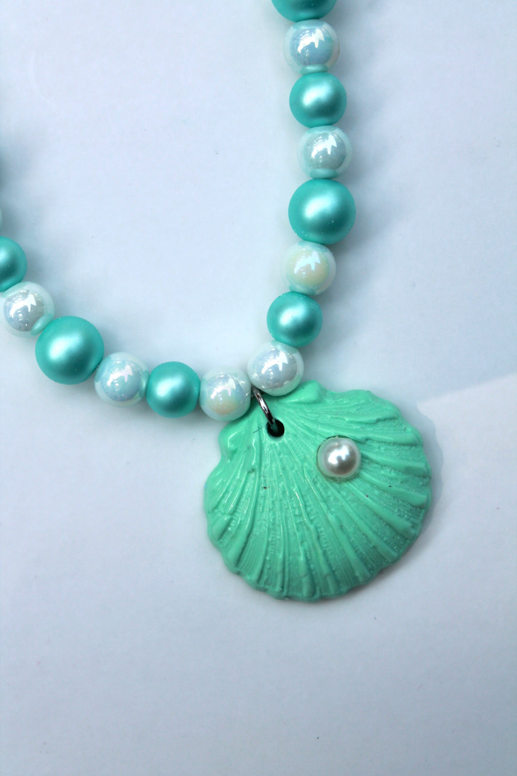 Green and White Beaded Necklace with Green Seashell